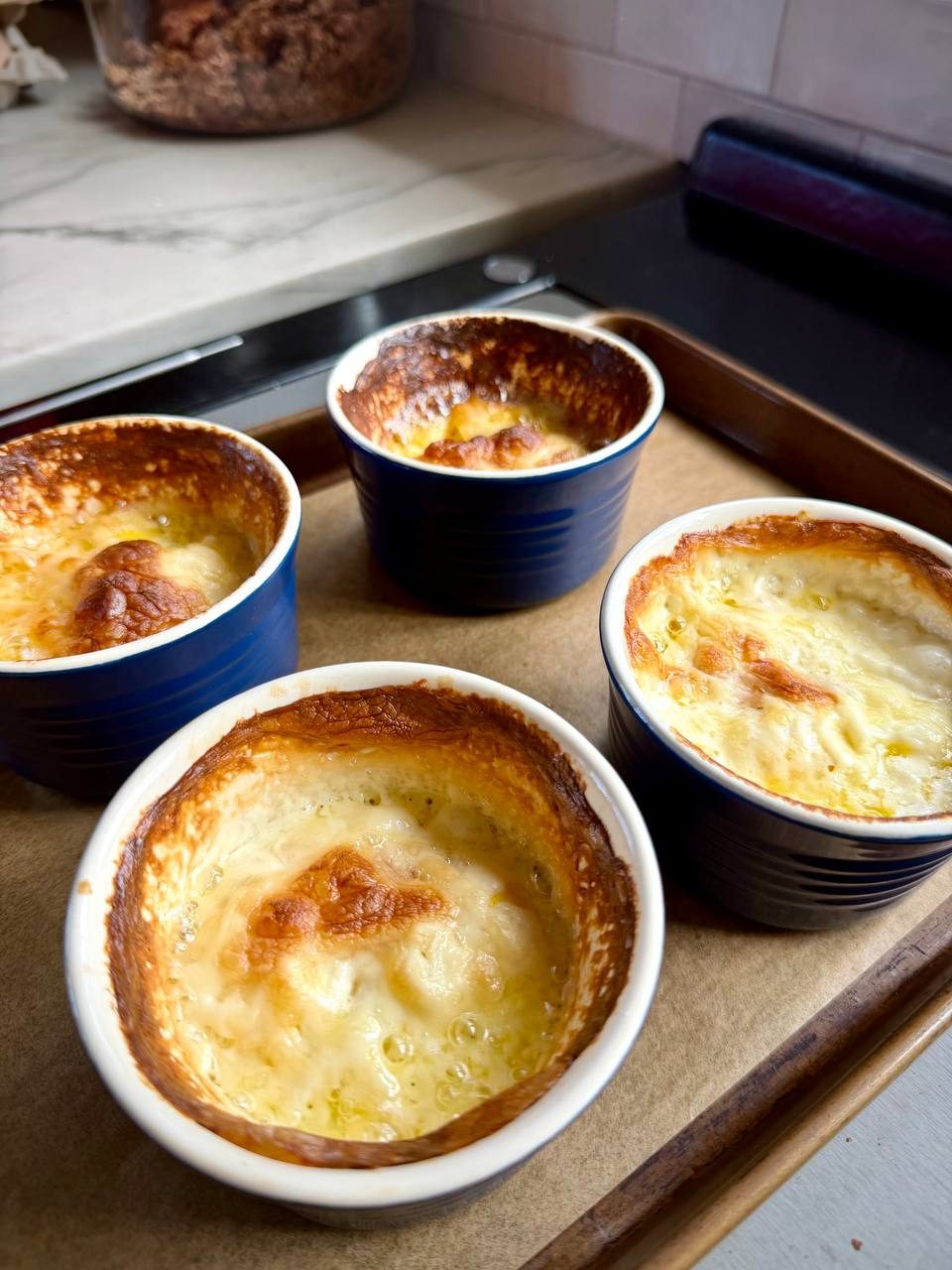 Baked eggs in cream in four ramekins