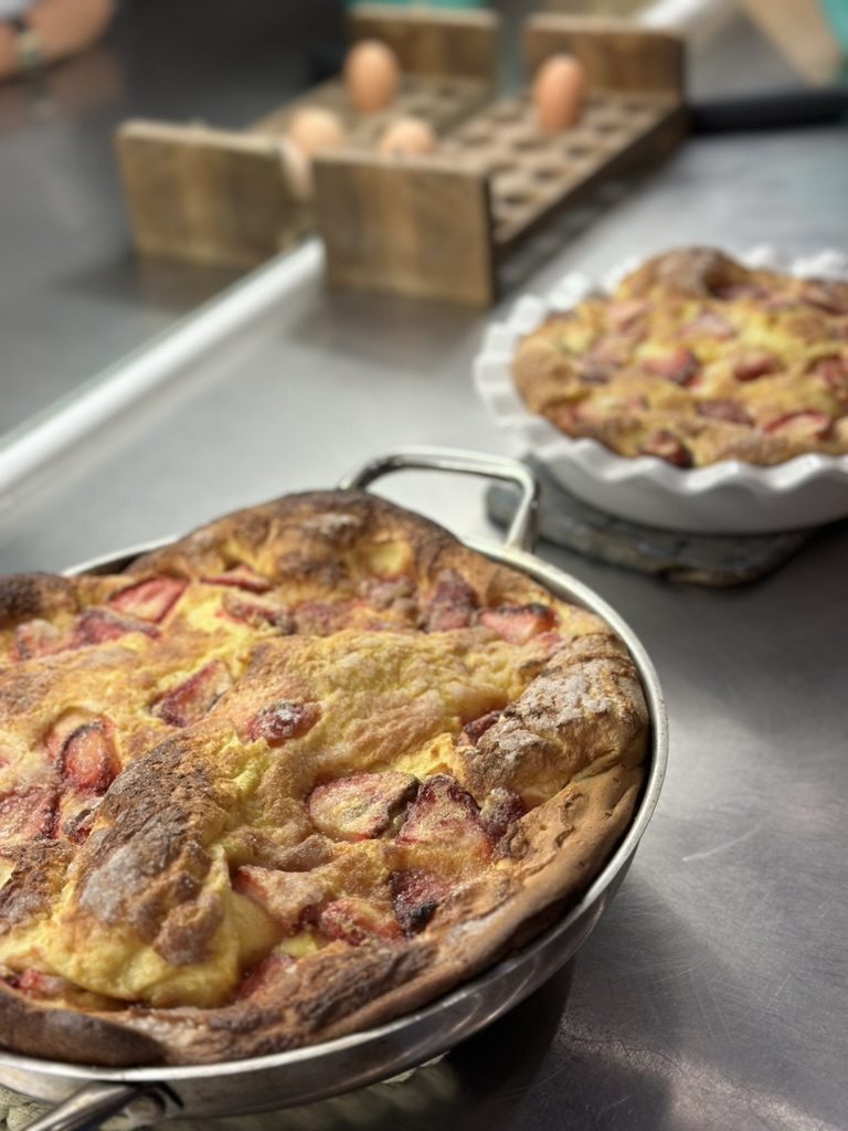 A strawberry egg tart baked in a skillet